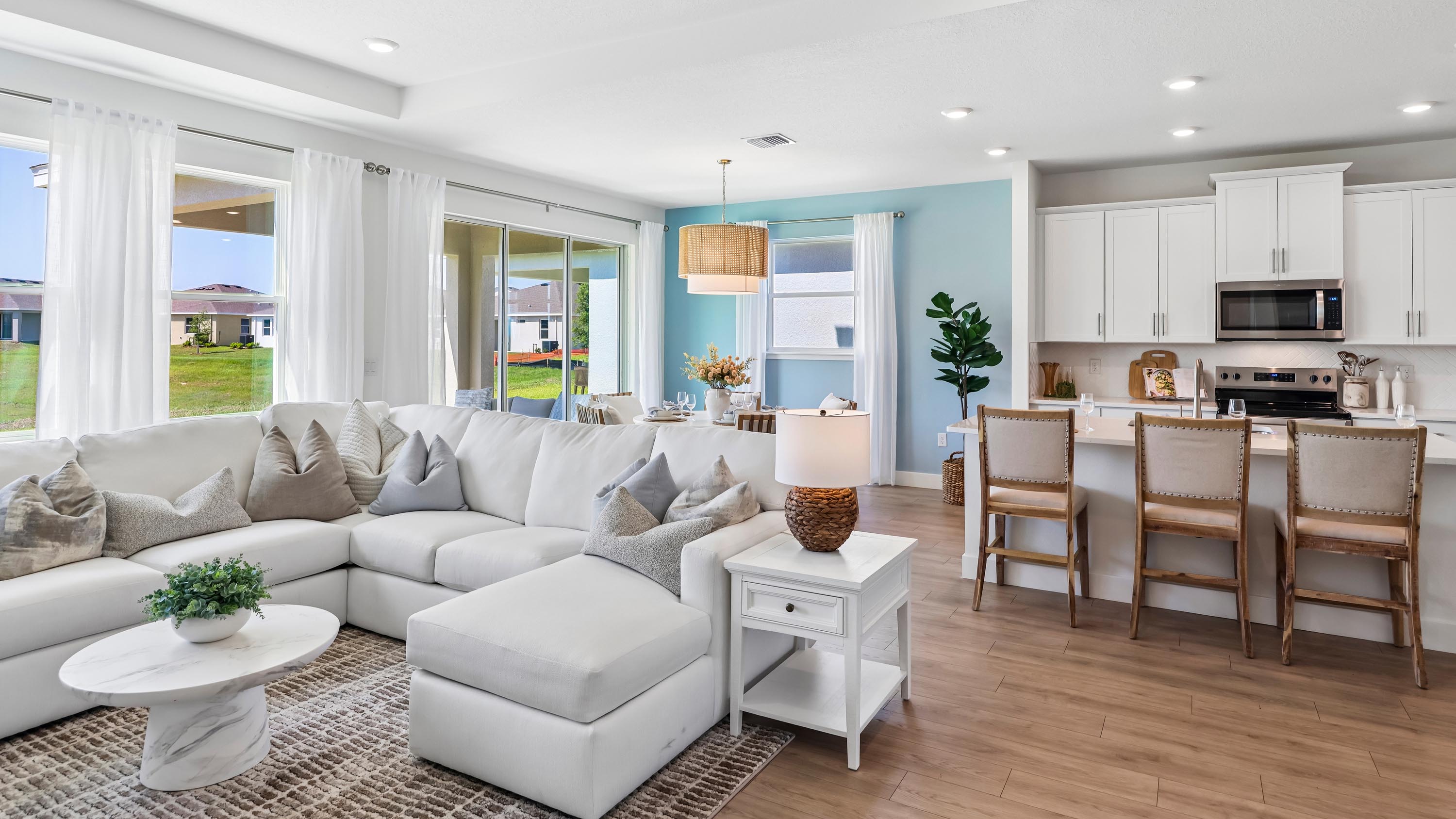 Holden living room, kitchen island and dining area